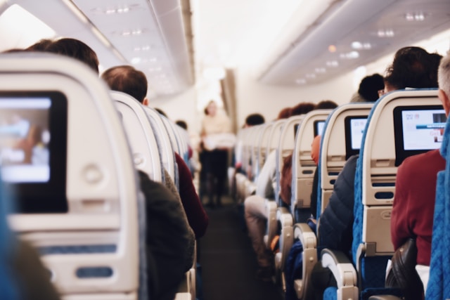 Understanding airlines ticket rules Inside a flight, ready for take off.